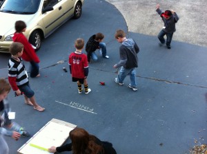 lego kids party racing cars on the driveway