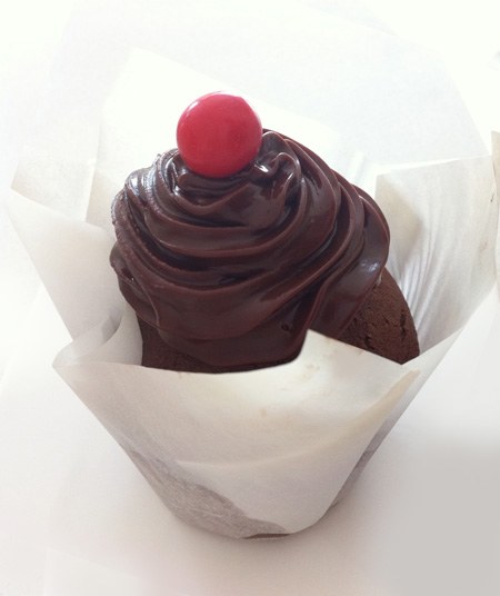 chocolate orange ganache swirl decoration on cupcake