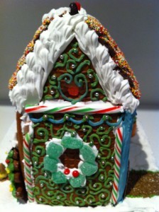 piped royal icing on gingerbread house