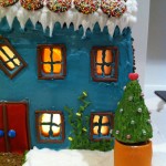 gingerbread house decoration using royal icing and fondant