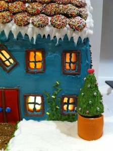 gingerbread house decoration using royal icing and fondant