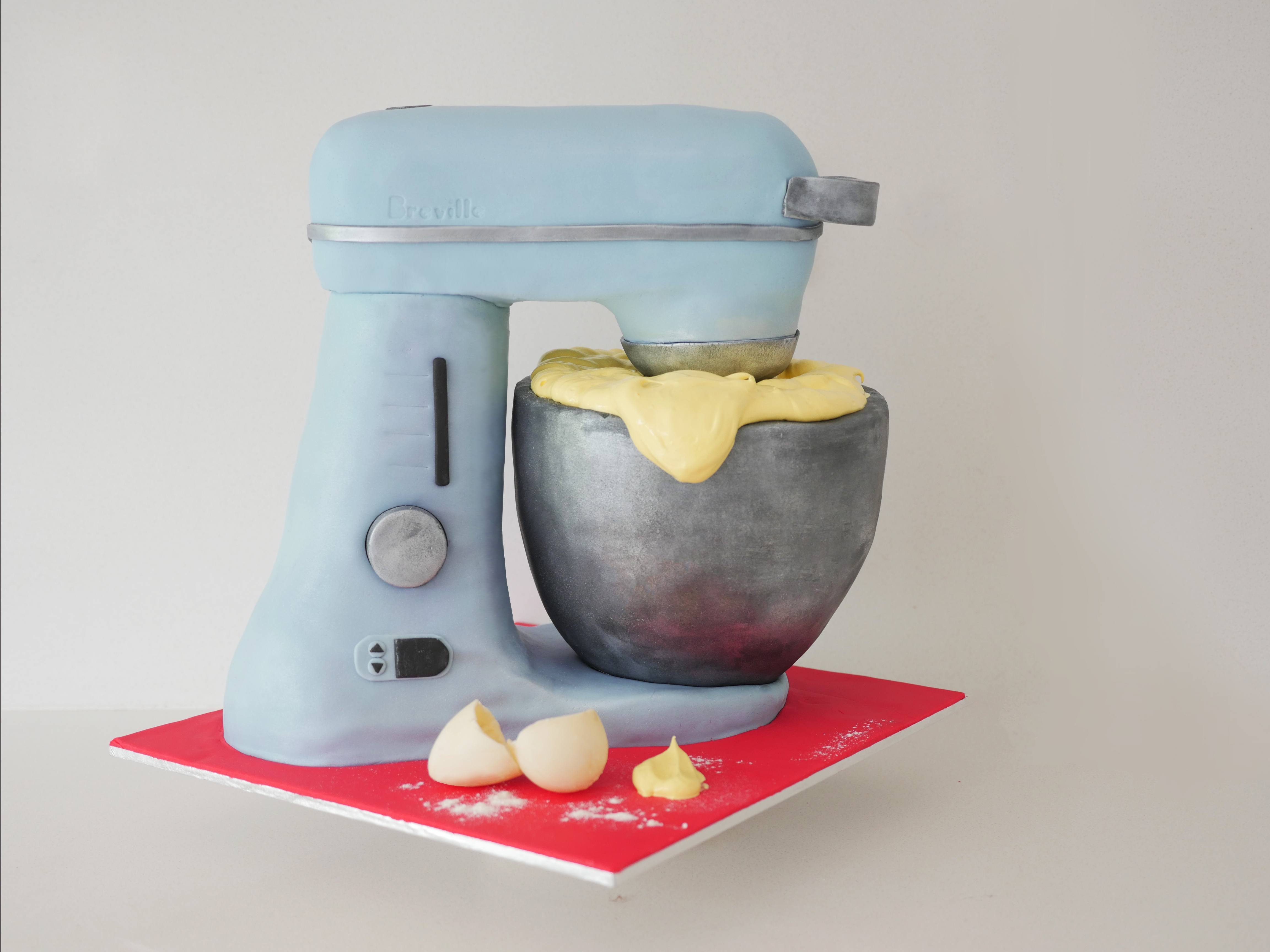 Mixer cake outlet